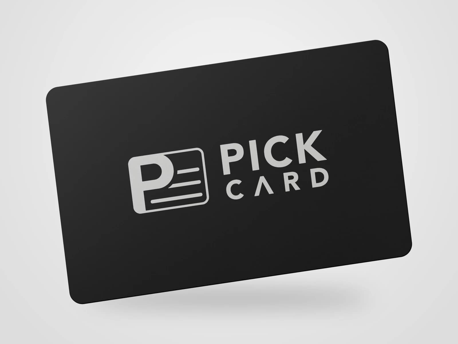 Black metal Pick Card with the engraved Pick Card logo floating in a light studio